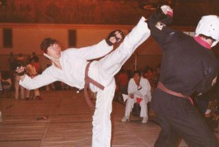 Lou Storiale competing as a brown belt in a Tae Kwon Do tournament in high school